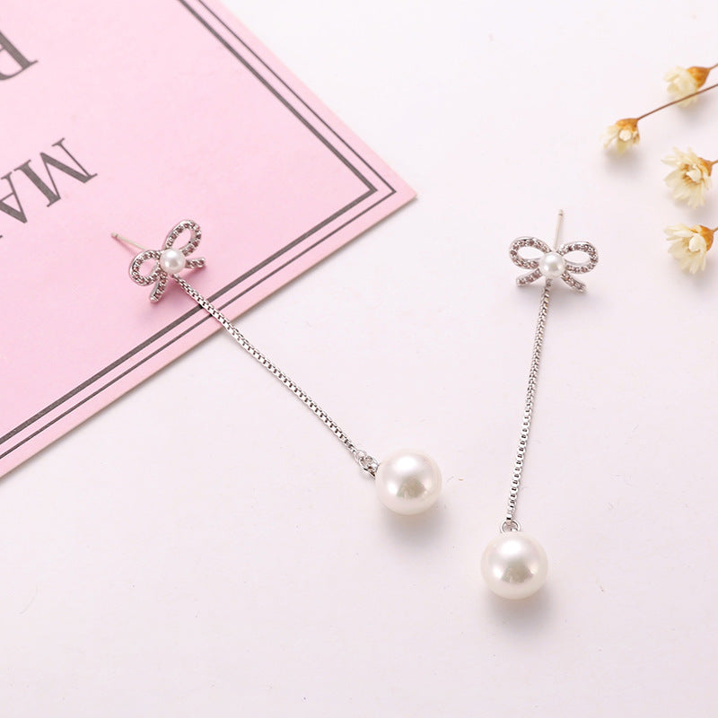 Silver Bow Pearl Drop Earrings