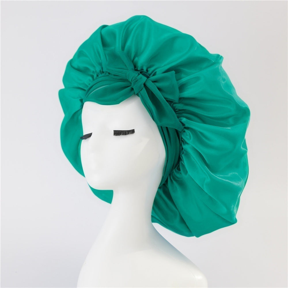 Bonnet en satin de soie pour cheveux bouclés